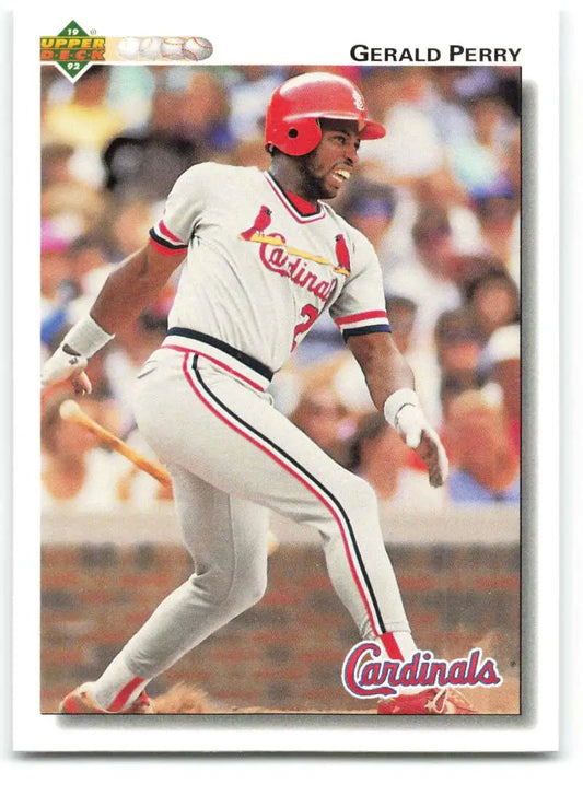 Gerald Perry at bat in white and red uniform - St. Louis Cardinals Baseball Card