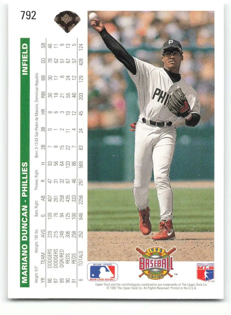 Mariano Duncan mid-throw in white uniform on 1992 Upper Deck Phillies Baseball Card