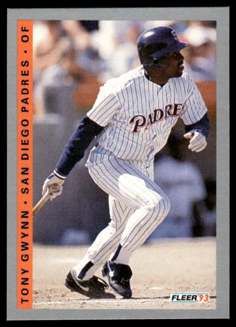 Baseball player in San Diego Padres pinstriped uniform, showcasing Tony Gwynn’s swing