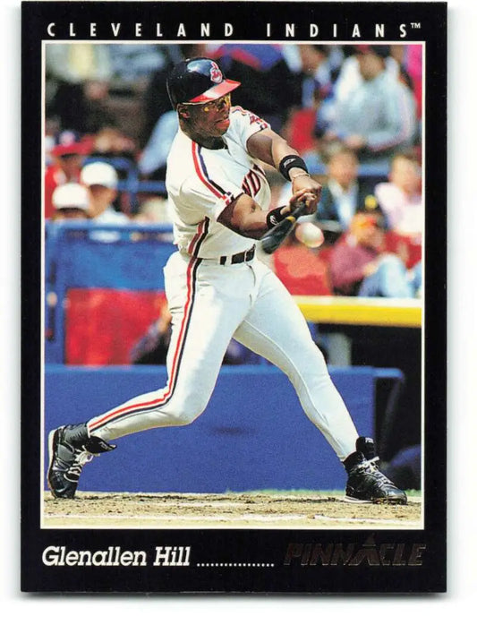 Baseball card of Glenallen Hill swinging bat in Cleveland Indians white uniform