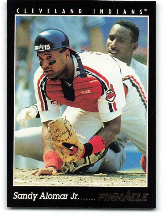 Baseball card of Sandy Alomar sliding into base for the Cleveland Indians