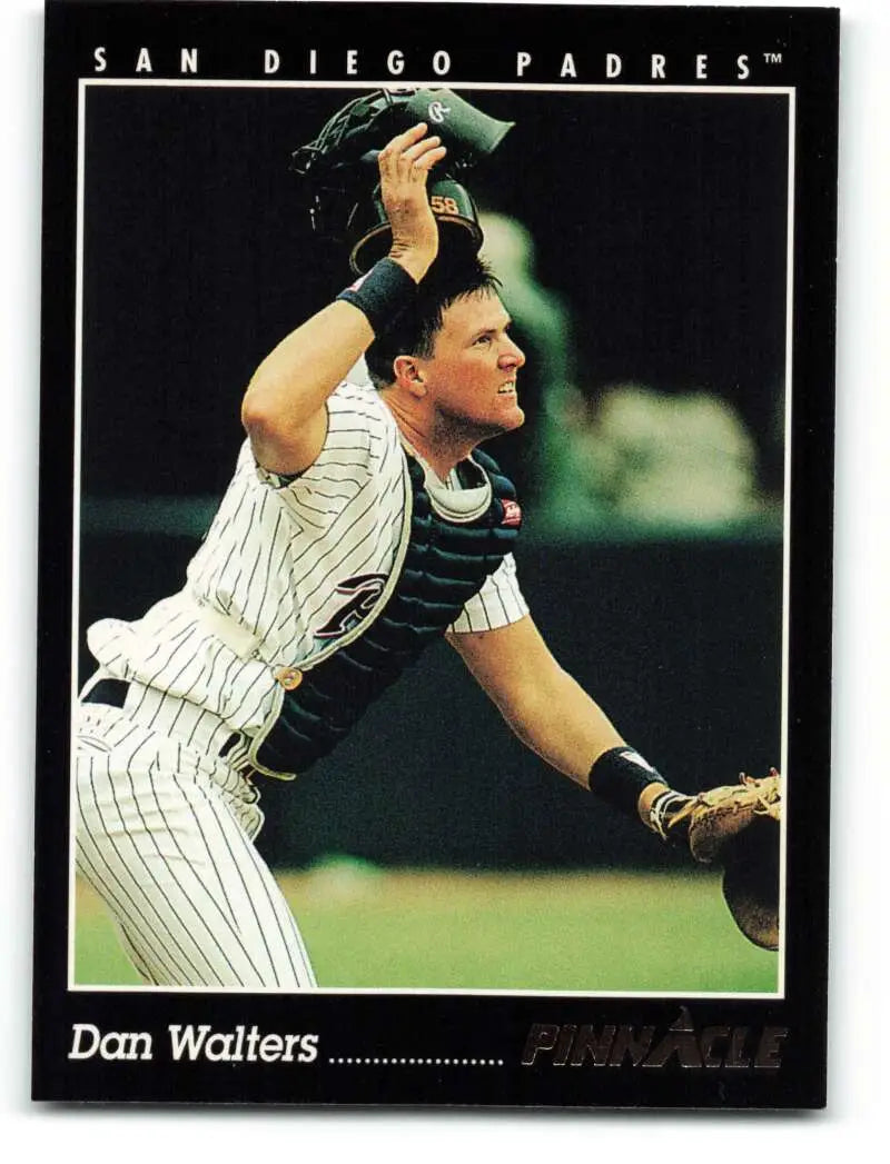 Baseball player in San Diego Padres uniform catching ball on Dan Walters baseball card