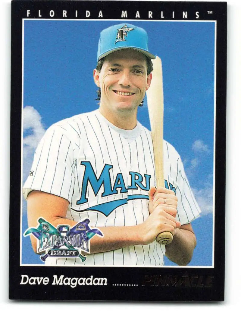 Florida Marlins baseball card of Dave Magadan in pinstriped home uniform with bat