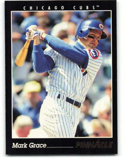 Mark Grace swinging bat in Chicago Cubs pinstriped uniform baseball card image