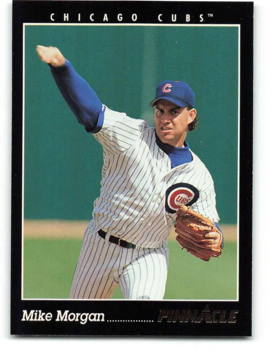 Chicago Cubs player Mike Morgan in pinstripe uniform throwing a pitch on baseball card