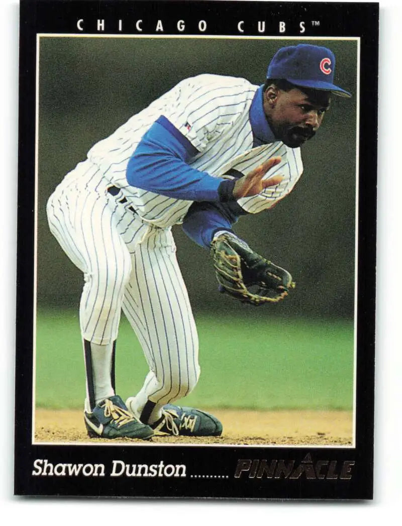 Chicago Cubs Shawon Dunston crouching in fielding position on a baseball card