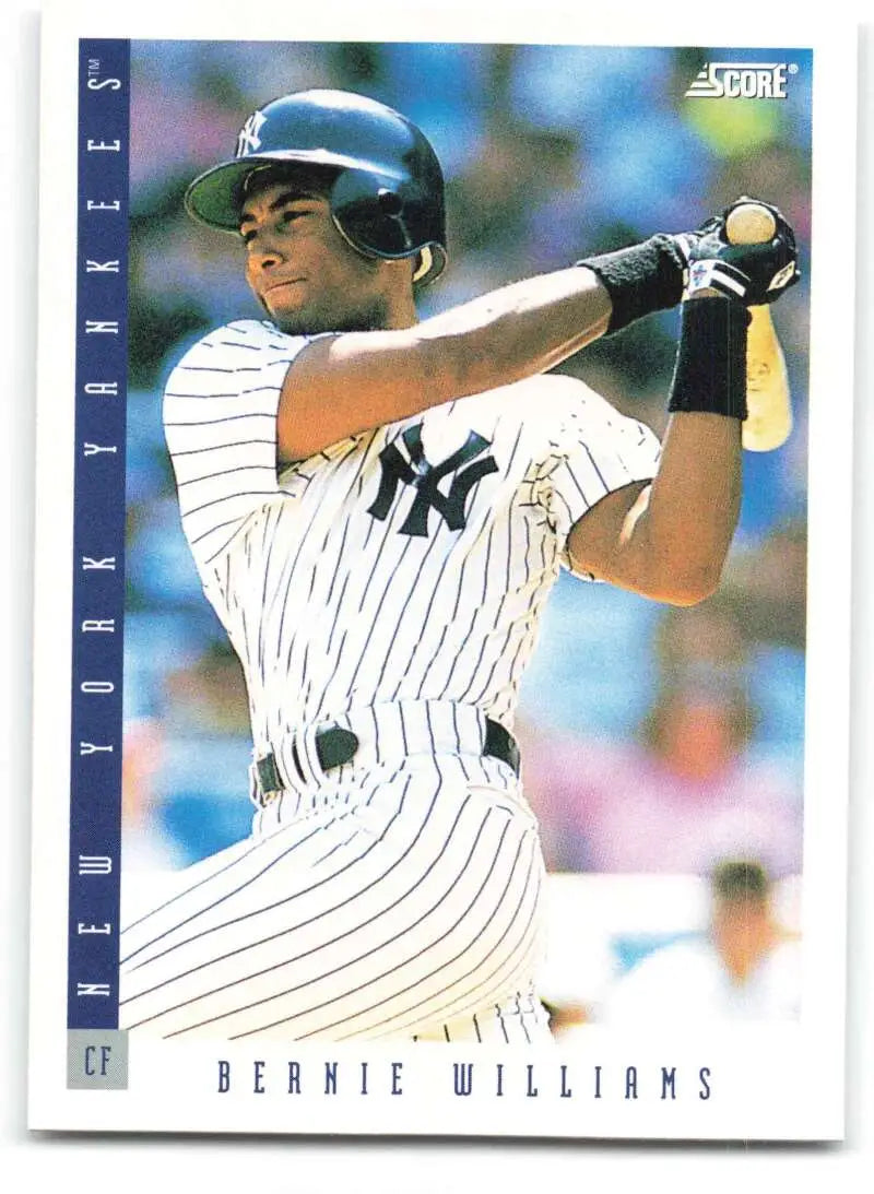 Baseball card of Bernie Williams in a New York Yankees pinstriped uniform at bat