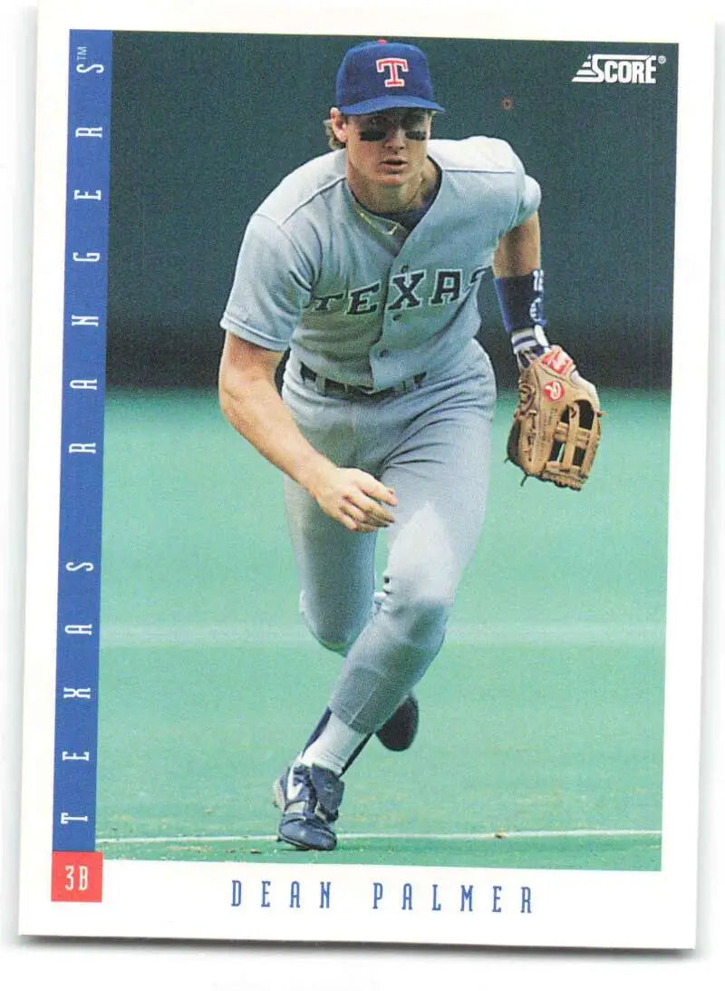 Baseball card of Dean Palmer in Texas Rangers gray road uniform fielding position