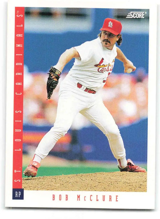 Bob McClure mid-pitch in a white St. Louis Cardinals uniform on a baseball card