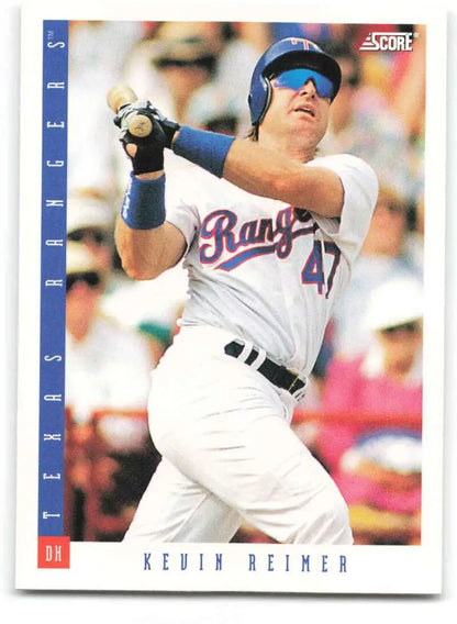 Baseball card of Kevin Reimer in Texas Rangers uniform swinging a bat