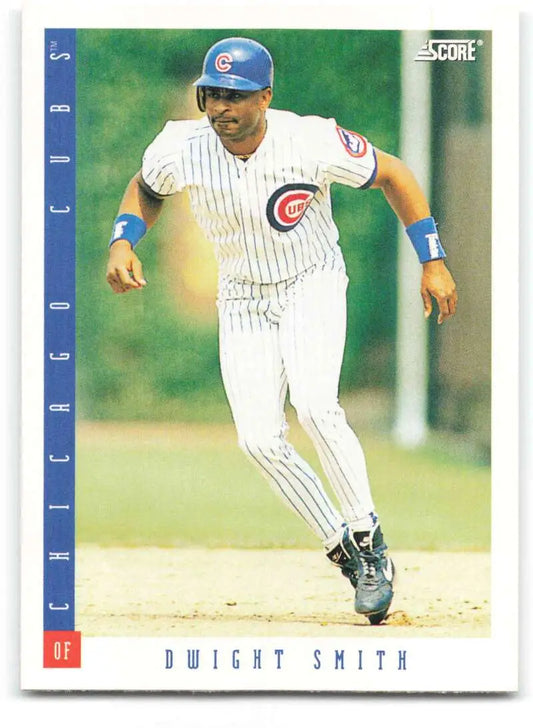 Baseball card of Dwight Smith in Chicago Cubs white pinstriped uniform running on field