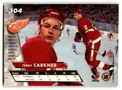 Hockey trading card of Terry Carkner in red uniform for Detroit Red Wings original gloss