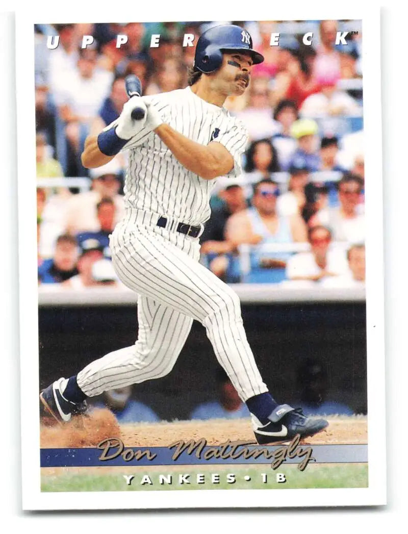 Don Mattingly swinging a bat in New York Yankees pinstripe uniform baseball card