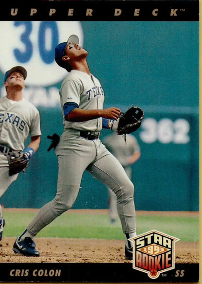 Cris Colon in gray uniform tracking a fly ball - Texas Rangers Baseball Card