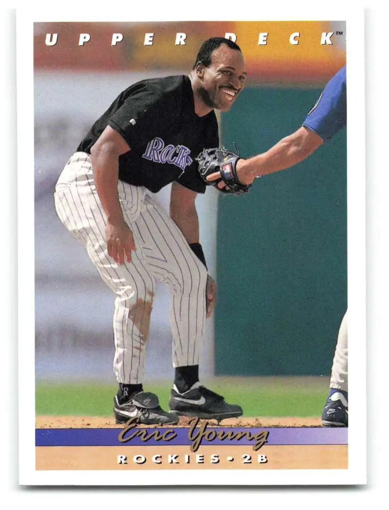 Eric Young smiling in pinstriped uniform on 1993 Upper Deck Colorado Rockies card