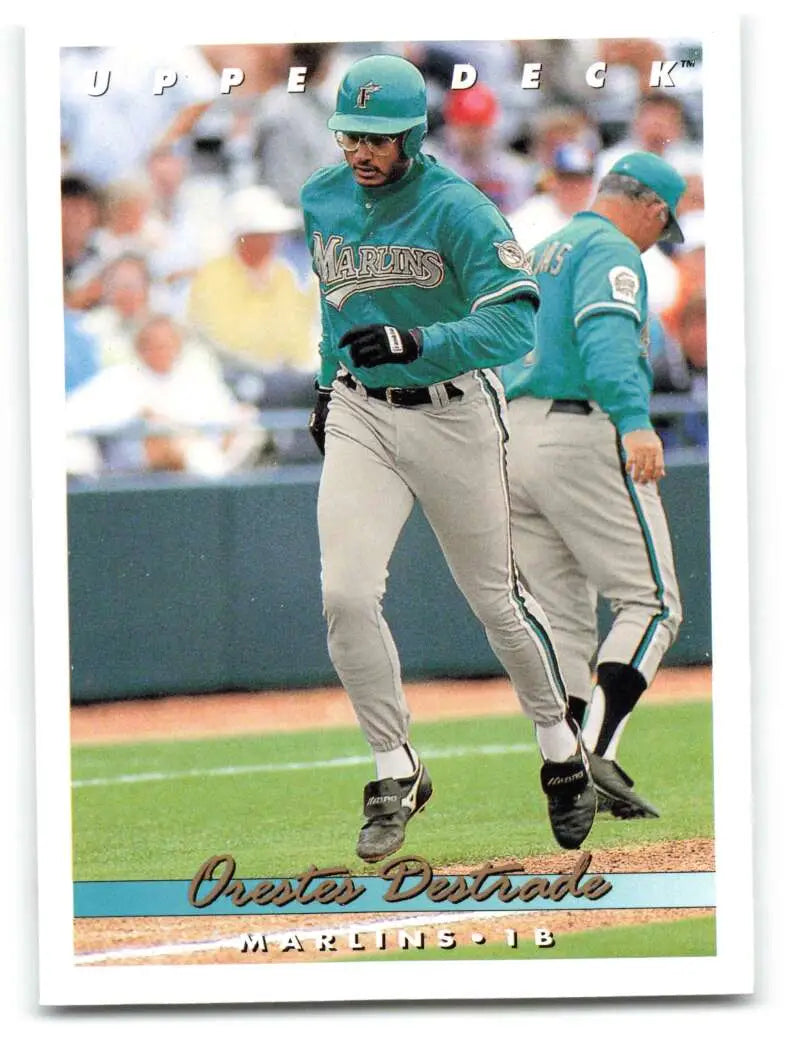 Orestes Destrade in teal and gray uniform for Florida Marlins on the field