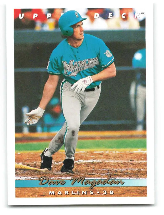 Florida Marlins baseball card featuring Dave Magadan in teal uniform at bat from Upper Deck