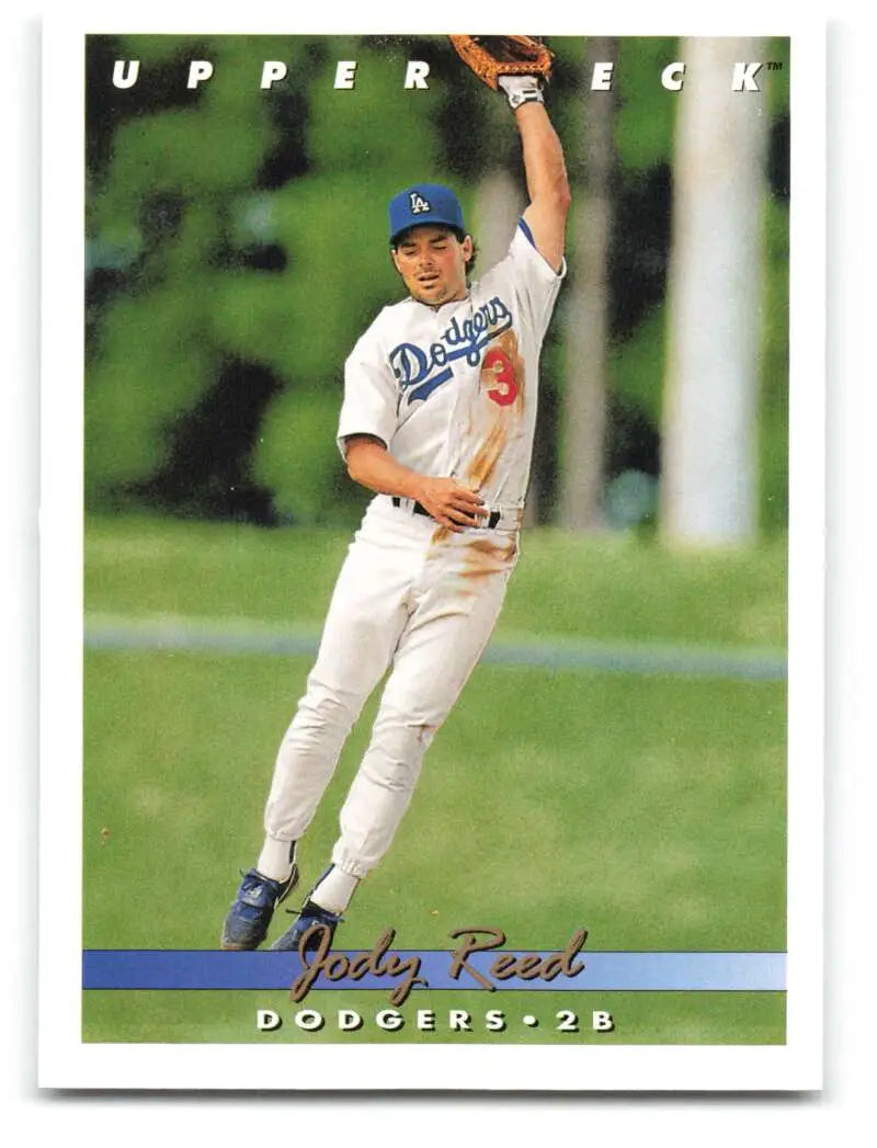 Baseball card of a Los Angeles Dodgers second baseman making a leaping catch in white uniform