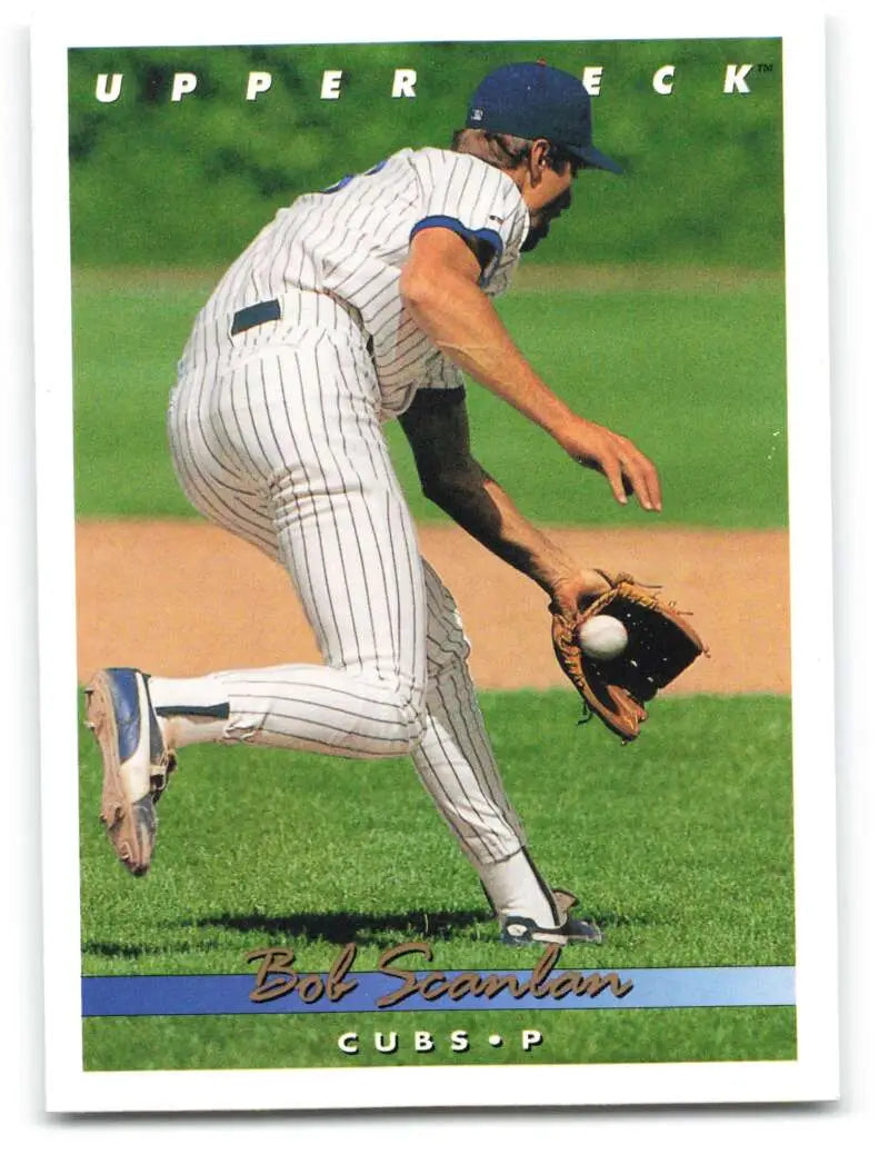 Bob Scanlan fielding a ground ball in Chicago Cubs pinstriped uniform baseball card