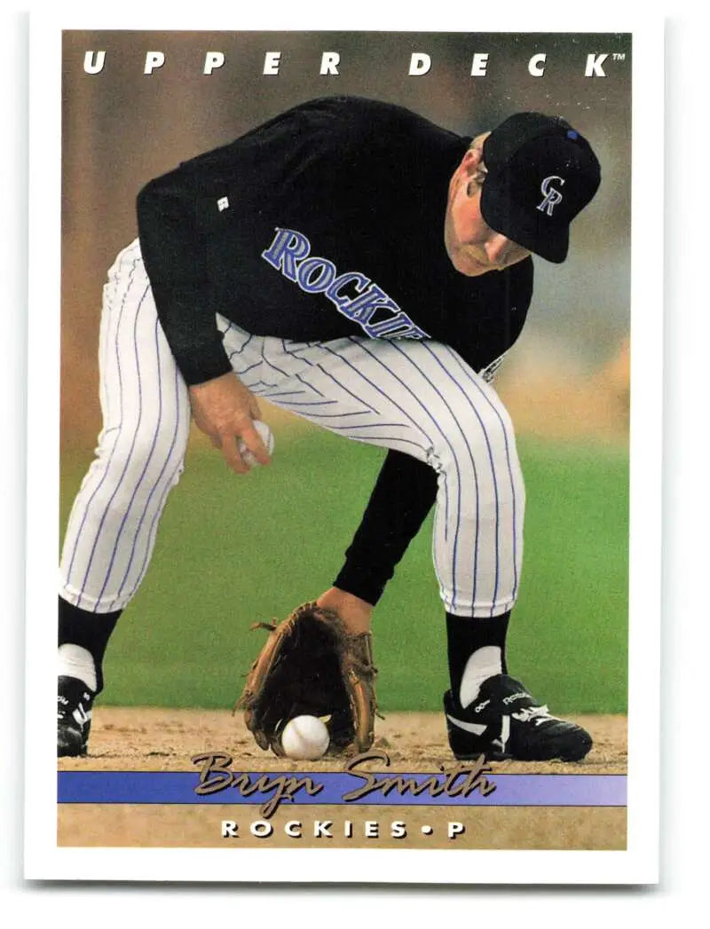 Baseball card of Bryn Smith fielding a ground ball for the Colorado Rockies