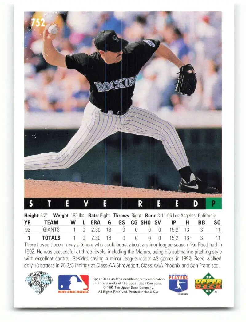 Steve Reed mid-pitch delivery in Colorado Rockies uniform on baseball card