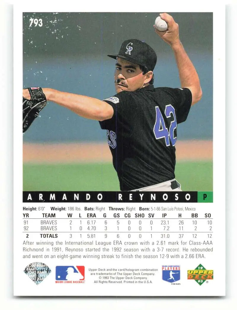 Colorado Rockies Armando Reynoso pitching in black uniform on Upper Deck baseball card