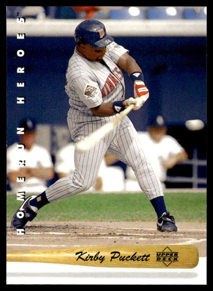 Baseball player in Minnesota Twins uniform swinging bat, showcasing HR24 Kirby Puckett