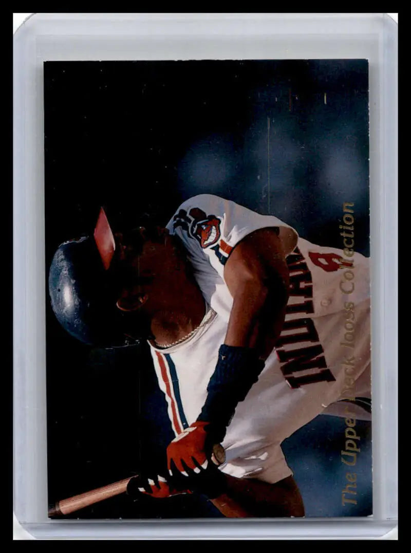 Baseball player in white uniform swinging bat for 1993 Upper Deck Albert Belle card