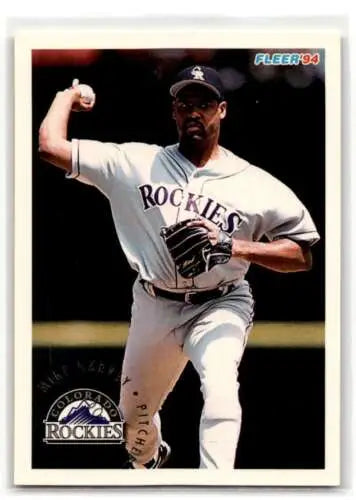 Baseball player in white Colorado Rockies uniform pitching, U124 Mike Harkey card original gloss