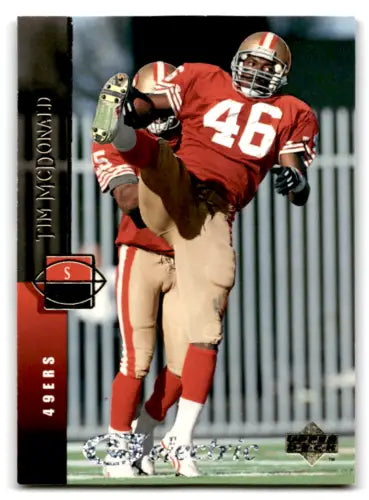 Football player in action from 1994 Upper Deck Electric Silver #235 Tim McDonald