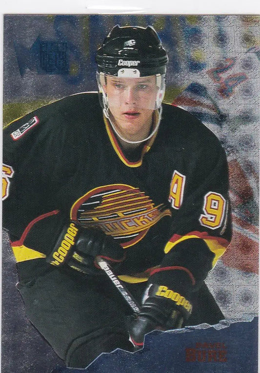 Ice hockey player in black Vancouver Canucks jersey, Pavel Bure #9, 1995-96 Fleer Metal