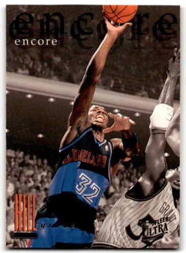 Basketball player Tyrone Hill in action on 1995-96 Fleer Ultra trading card