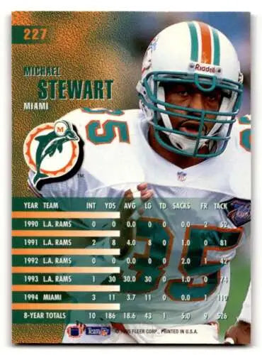 Michael Stewart Miami Dolphins football card with original gloss from 1995 Fleer