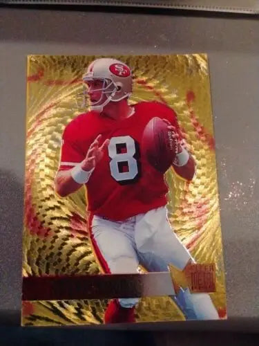 Fleer Metal 1995 Gold Blaster card of Steve Young from San Francisco 49ers