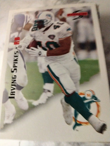 Irving Spikes football card from 1995 Score featuring the Dolphins team logo