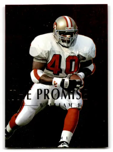 Football player in uniform from SkyBox Premium Promise 1995 original gloss card