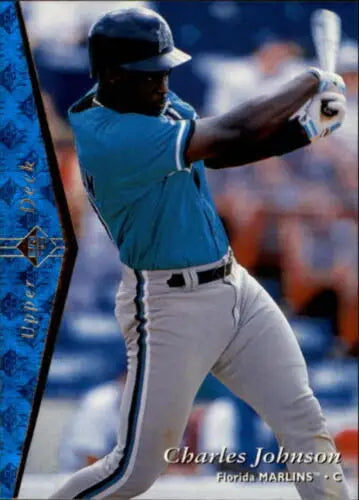 Baseball player swinging bat, showcasing original gloss Charles Johnson Marlins card