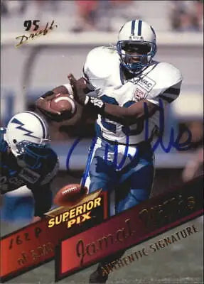 Football player Jamal Willis in white and blue uniform carrying ball - Superior Pix Autographs