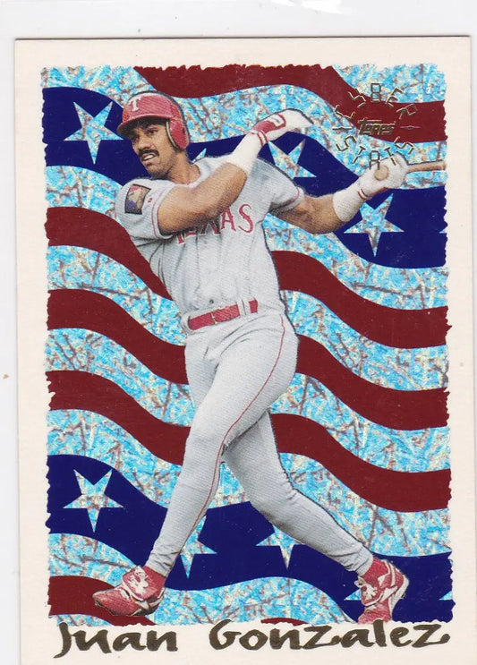 Baseball player Juan Gonzalez Texas Rangers swinging bat with stars and stripes backdrop