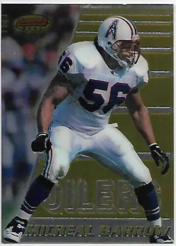 Football player Micheal Barrow in uniform on 1996 Bowman’s Best Oilers card with original gloss