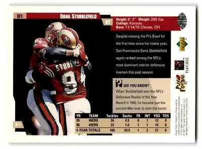 Football trading card of San Francisco 49ers player Dana Stubblefield, #97, in red and white