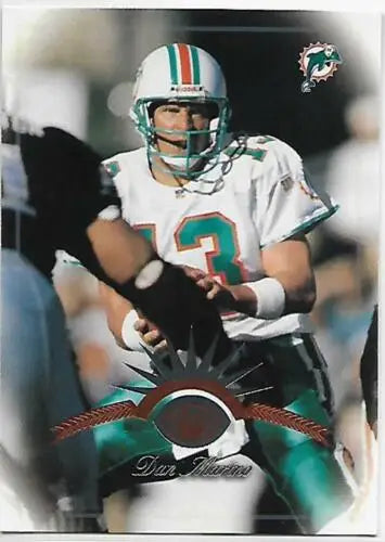 Dan Marino 1997 Leaf #7 NM-MT Dolphins card with original gloss, popular among collectors