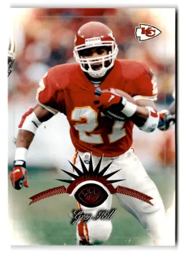 Football player Greg Hill in red uniform, featured in 1997 Leaf original gloss card