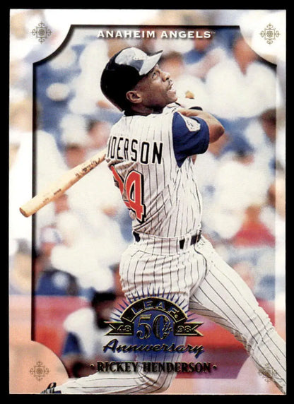 Rickey Henderson swinging bat in pinstriped uniform on Angels baseball card