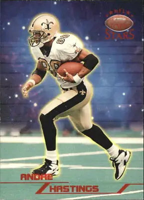 Football player in action featuring Andre Hastings from Topps Stars New Orleans Saints