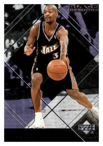 Basketball player in action on 1999-00 Black Diamond #84 Bryon Russell NM Near Mint Jazz card