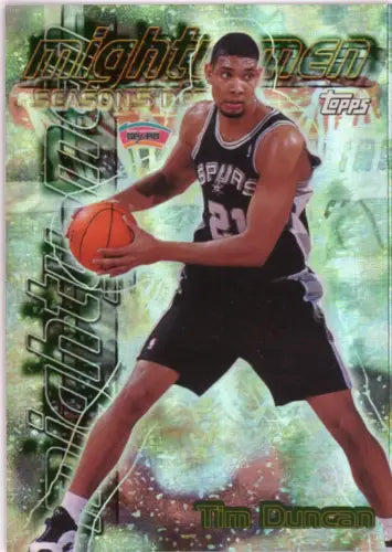 Basketball trading card of Tim Duncan in black jersey for San Antonio Spurs 1999-00 Topps