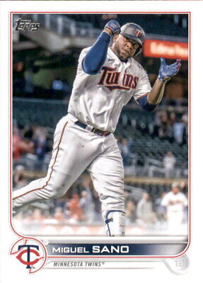 Baseball trading card of Miguel Sano Minnesota Twins player mid-swing in white uniform