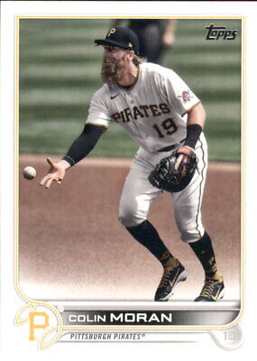 Colin Moran fields a ground ball in a white Pittsburgh Pirates uniform