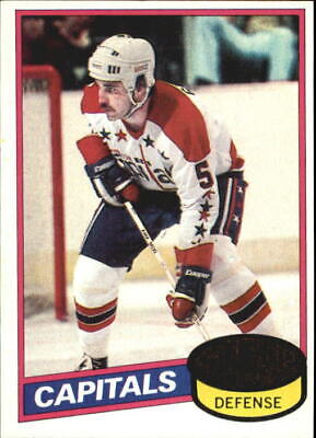 Rick Green skating in defensive stance in Washington Capitals uniform on hockey card